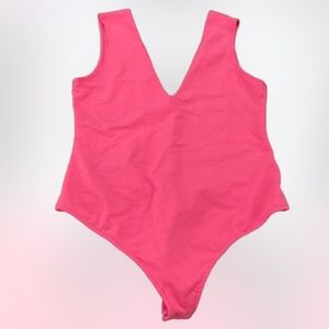 Free People Intimately Keep it Sleek deep v pink thong bodysuit size medium.